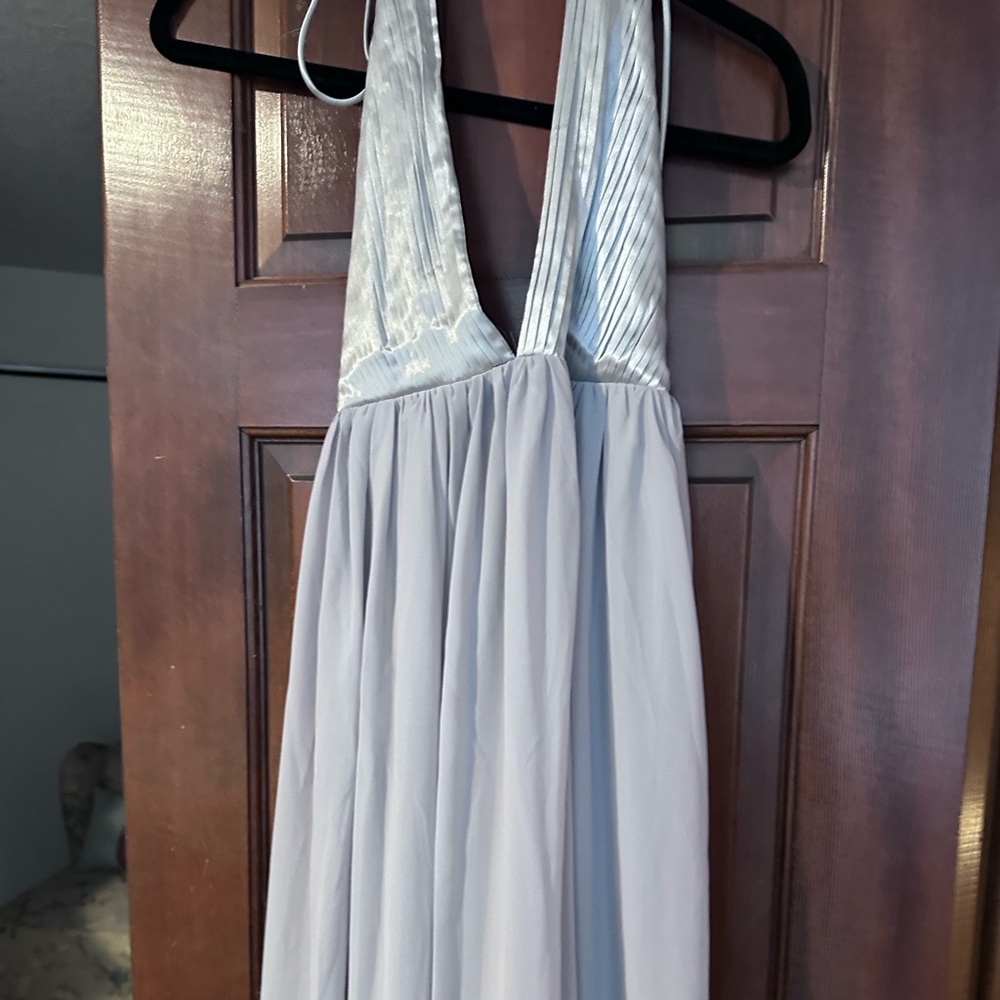Beautiful long silver Dress. My daughter ordered it and never wore it.